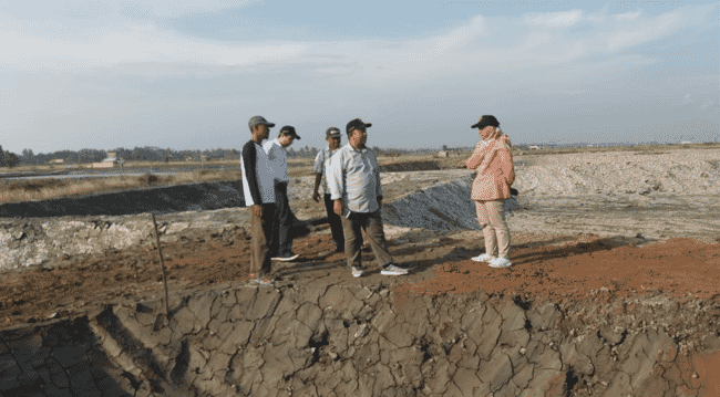 people standing in a construction site