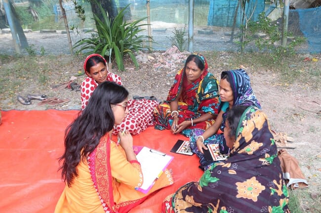 group of women sitting down